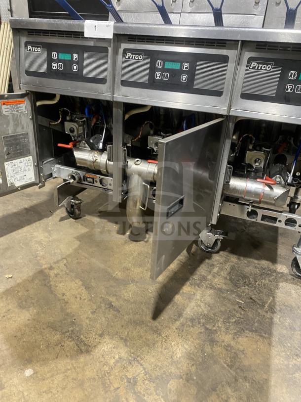 Pitco SG14-JS triple-bay deep fryer, stainless steel, digital control, on casters, natural gas, 40 lb capacity, with backsplash.