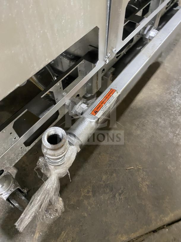 Pitco SG14-JS commercial fryer detail, showing stainless steel construction and gas connection. Appears well-maintained.