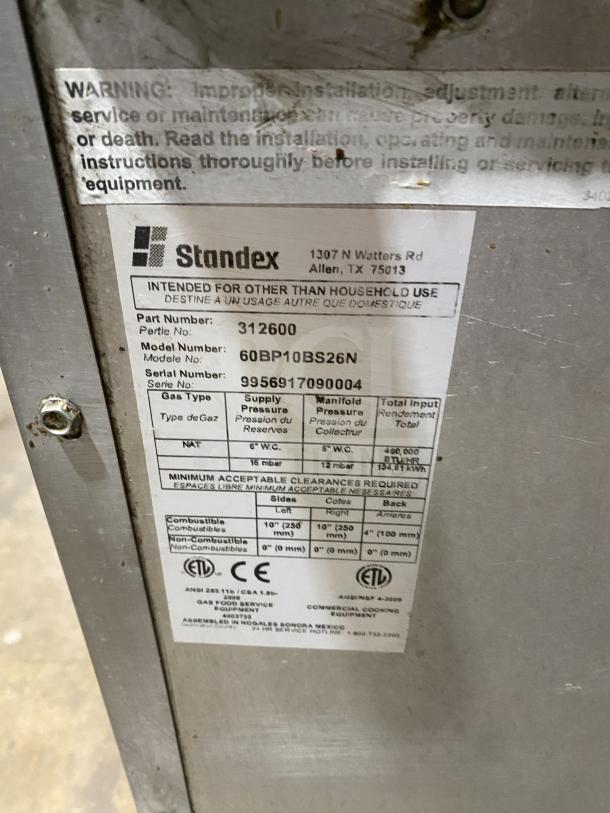 Bakers Pride 10-burner gas range and double oven combo. Model 60BP10BS26N, Serial 9956917090004, with back splash and salamander shelf.