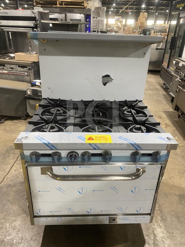 New Kutano 36″ commercial stainless steel 6-burner gas range with oven, model KUT-6-BR-N-36-N6, on legs, new condition.