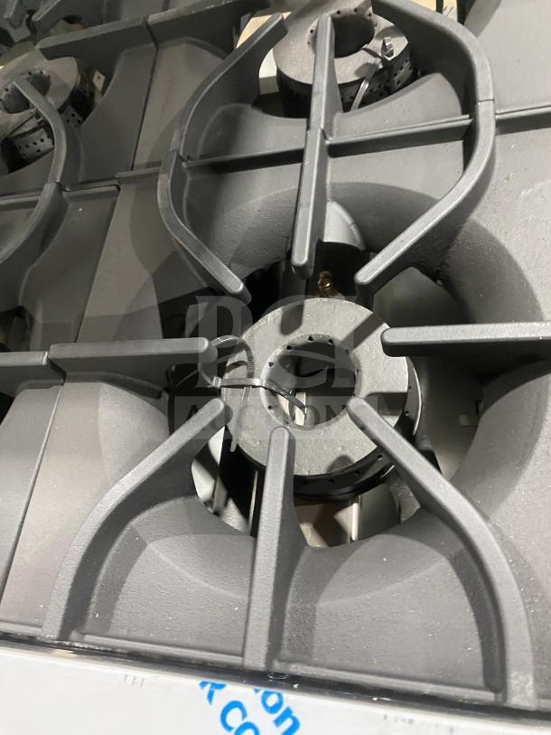 Commercial Kutano 36" stainless restaurant 6-burner gas range, model KUT-6-BR-N-36-N6, new condition.