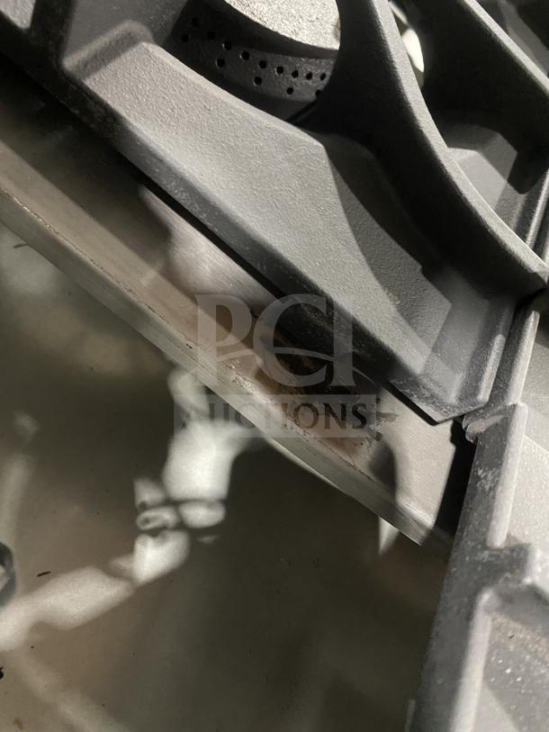 New Kutano 36" commercial stainless restaurant gas range, model KUT-6-BR-N-36-N6, with 6 burners and standard oven.