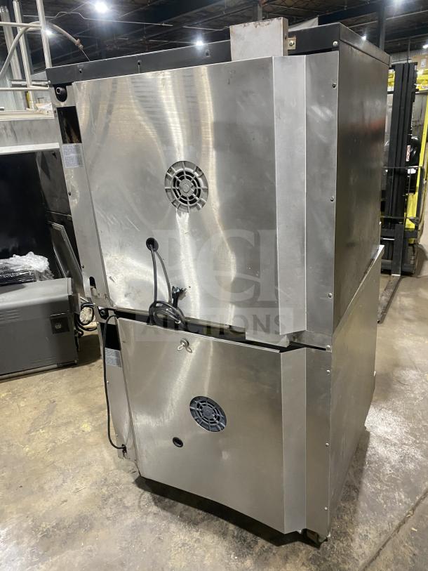 Garland Master 300 commercial convection oven, double stacked, stainless steel, natural gas, on casters, with view doors.