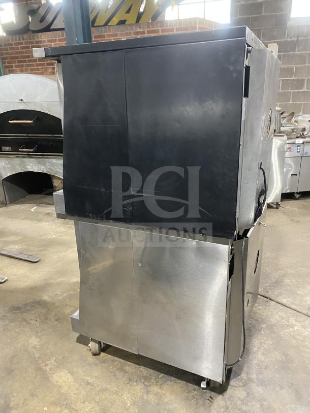 Garland Master 300 stainless steel double-stacked convection oven, natural gas, on casters, view-through doors, wire racks.