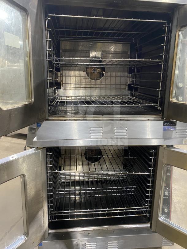Garland Master 300 double-stacked stainless steel convection oven, view-through doors, wire racks, on casters, natural gas powered.