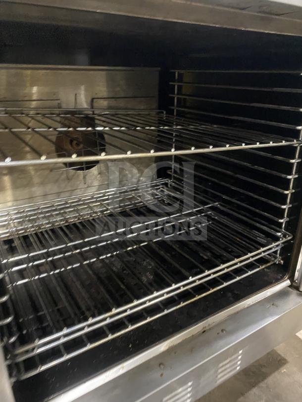 Garland Master 300 stainless steel double stacked convection oven, view-through door, wire racks, on casters, natural gas.