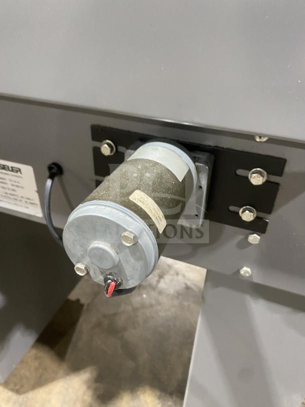 Beseler heavy-duty shrink wrap system, model HS-1520D, electric-powered, on casters, includes motor detail, 115V and 220V.