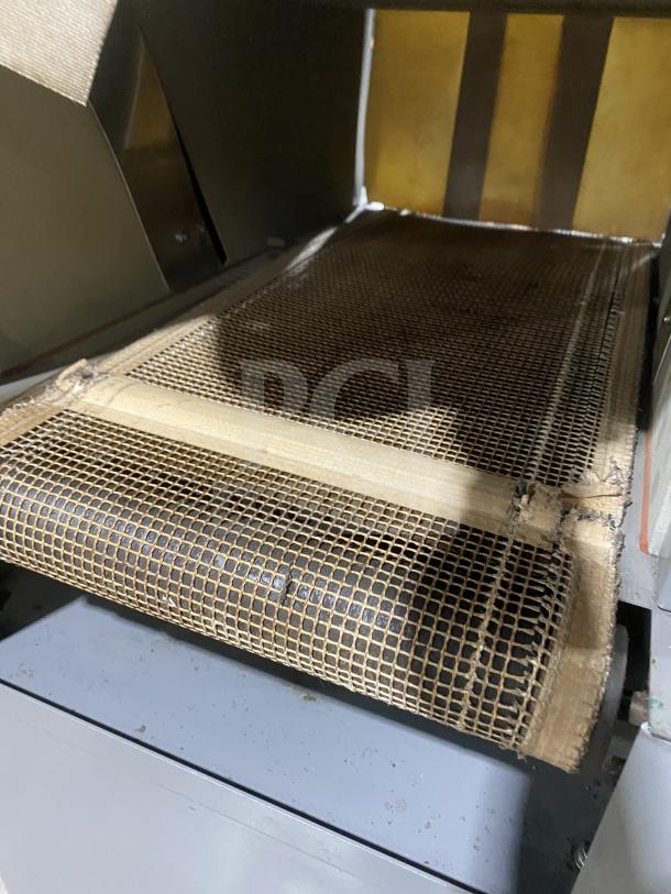 Beseler shrink wrap system, Model HS-1520D and TD-16-10, heavy-duty, electric, on casters, conveyor visible.