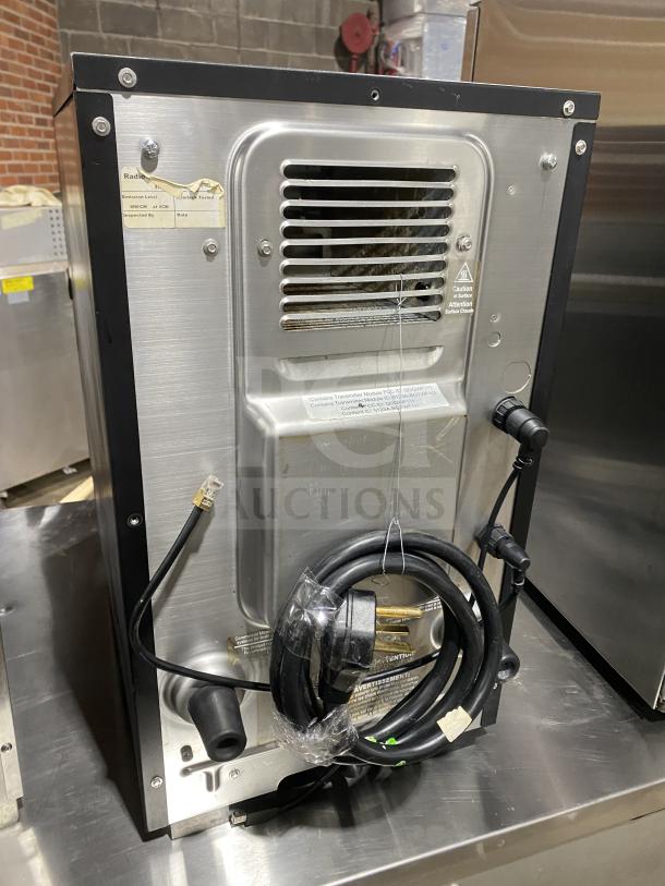 MerryChef commercial black electric countertop rapid cook oven, showing power cord and inspection labels, in good condition.