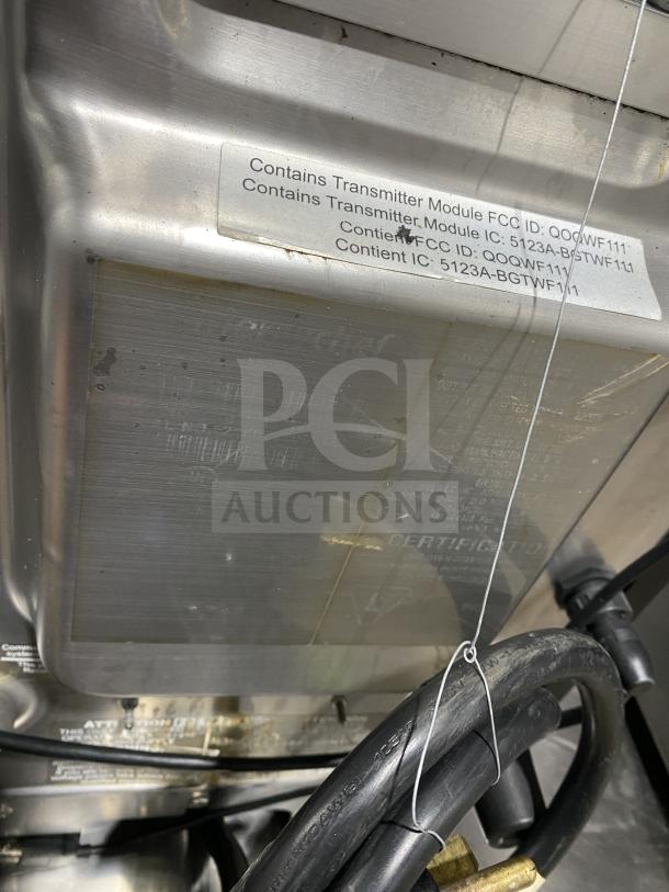 MerryChef black electric high-speed cook oven, commercial-grade. Features transmitter module details and wiring visible.