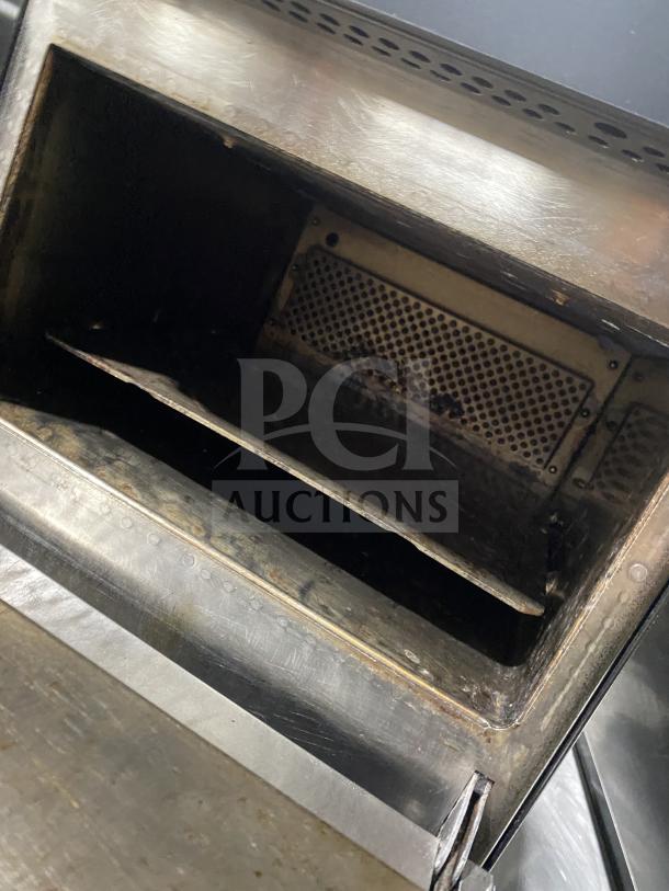 MerryChef commercial black countertop high-speed rapid cook oven, slightly used, electric powered, interior view showing condition.