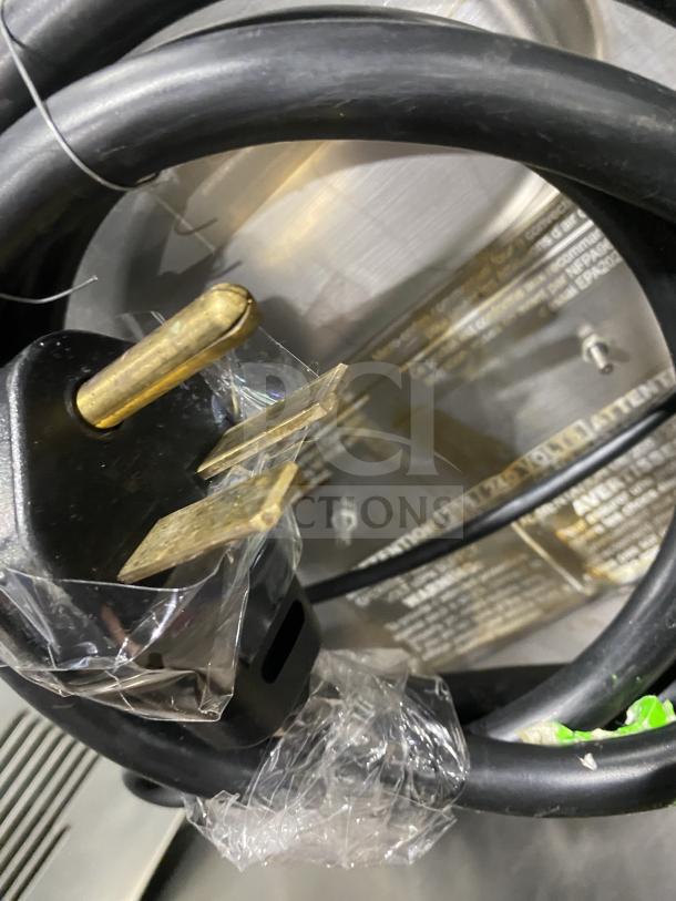 MerryChef commercial high-speed oven power cord and plug, good condition, model and specs label partially visible.