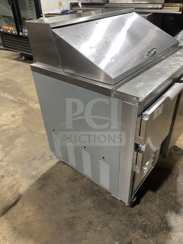 Leader LM36 S/C refrigerated sandwich prep table, stainless steel, on casters, 115V, commercial condition.