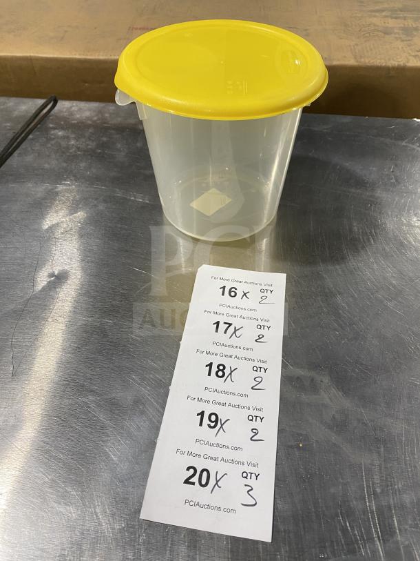 Rubbermaid round storage container with yellow lid, commercial-grade, clear body, excellent condition. Auction card visible.