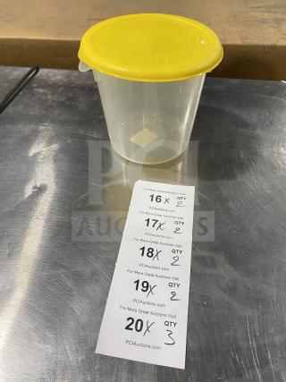 Rubbermaid round storage container with yellow lid, commercial-grade, clear body, excellent condition. Auction card visible.