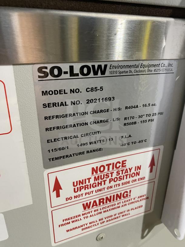 So-Low Commercial CA5-5 chest freezer, SN: 202141693, 115V, low temperature range: -40°C to -85°C, labels showing specs.