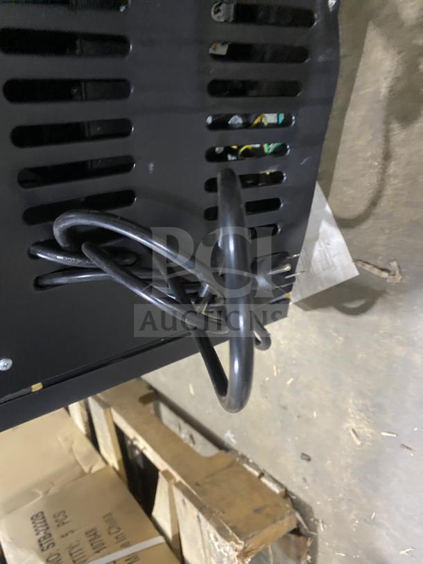 KoolMore MDR-9CP commercial fridge with black finish, visible wiring, and poly coated wire rack, 115V, good condition.