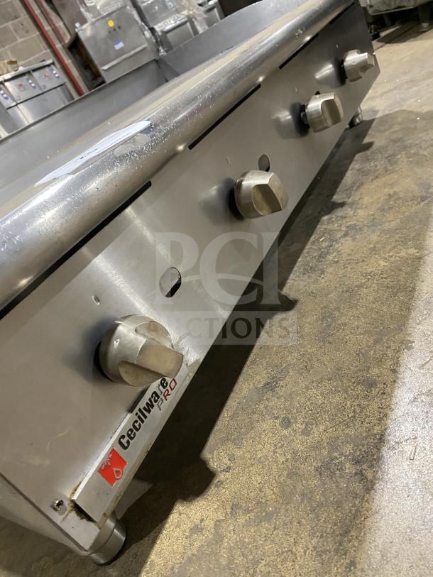 Cecilware Pro Series stainless steel natural gas countertop flat griddle with back and side splash, on legs. Excellent condition.