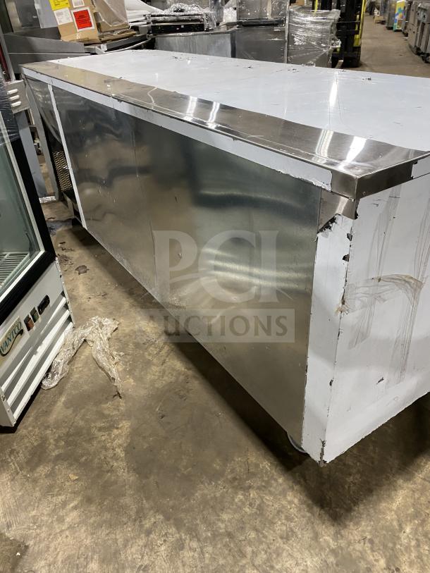 Customcool LB93SE stainless steel prep table with refrigeration, white finish, on casters, 115V 1 Phase, shows wear.
