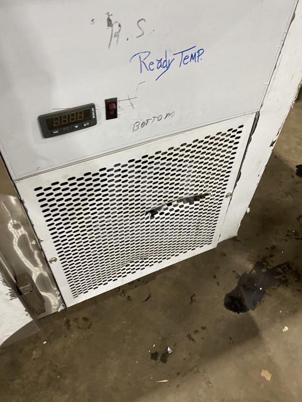 Customcool commercial stainless steel white prep table, Model LB93SE. Features casters, refrigeration, 115V, 1 Phase. Visible markings and temperature display.