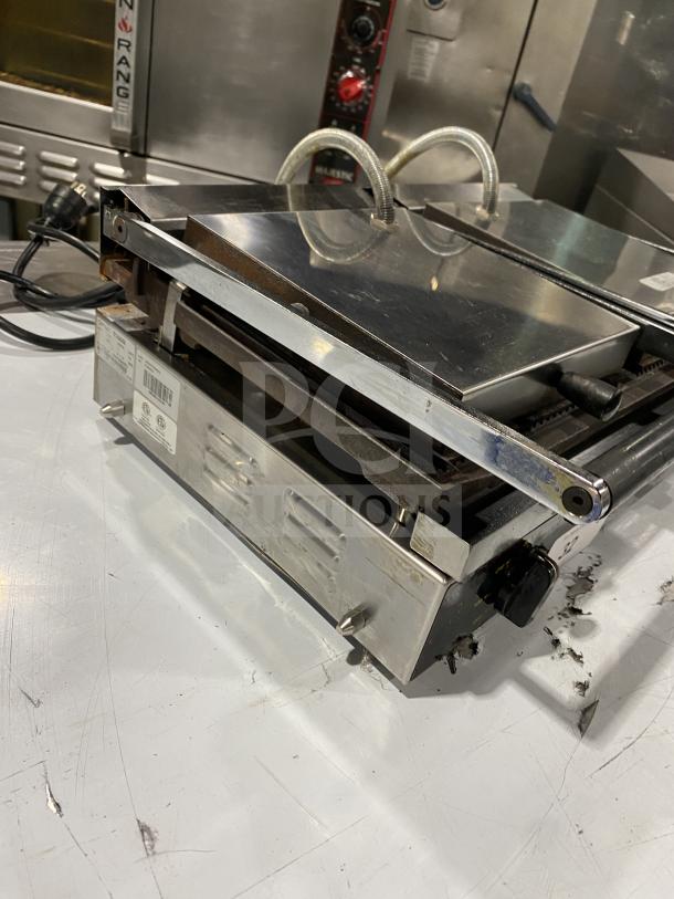 Ceciware TSG-2G commercial double panini press, electric, 230V, 1-phase, stainless steel, minor surface wear.