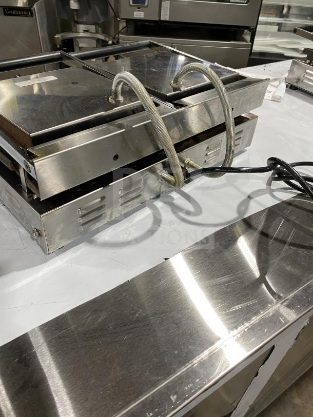 Ceciware TSG-2G commercial electric double panini press, stainless steel, 230V, 1 phase, used condition, visible power cables.