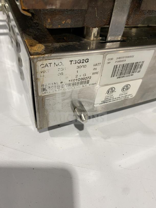 Ceciware commercial electric double panini press, model TSG-2G, 230V, 1 phase. Serial No: 1601G0272. Visible wear.