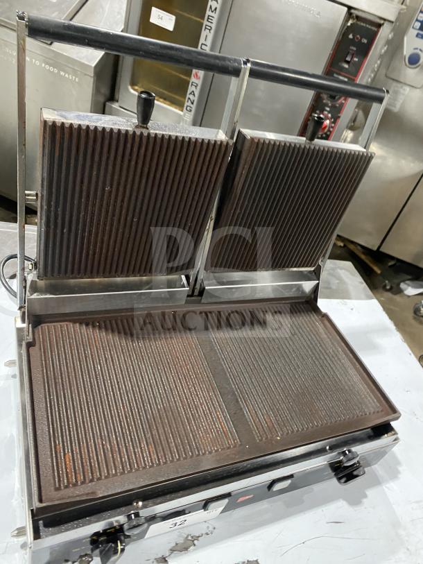 Ceciware TSG-2G Double Panini Press, electric, commercial-grade, 230V, ribbed plates, good condition. Model SN: 1601G0272.