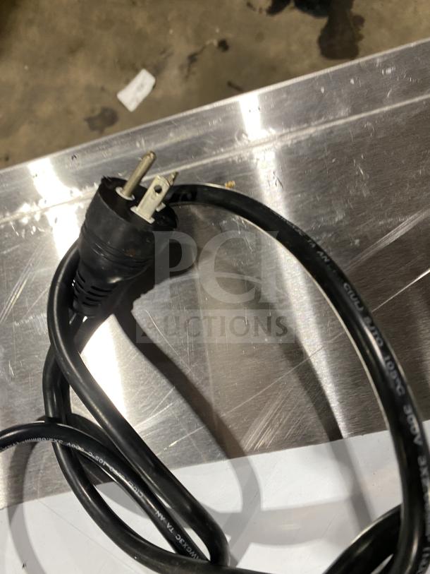 Ceciware double panini press, model TSG-2G, 230V, single phase, commercial-grade, visible power cord.