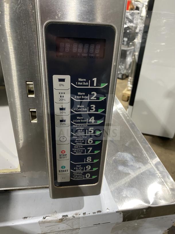Menumaster RFS12TSW commercial countertop microwave, stainless steel, digital push button control, 120V, used condition.