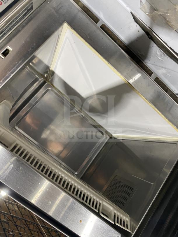 Menumaster RFS12TSW commercial microwave oven, stainless steel interior, digital push button control, good condition.