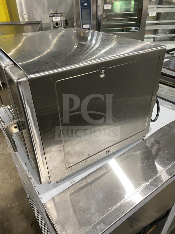 Menumaster RFS12TSW commercial stainless steel microwave, digital controls, 120V, good condition, countertop design.