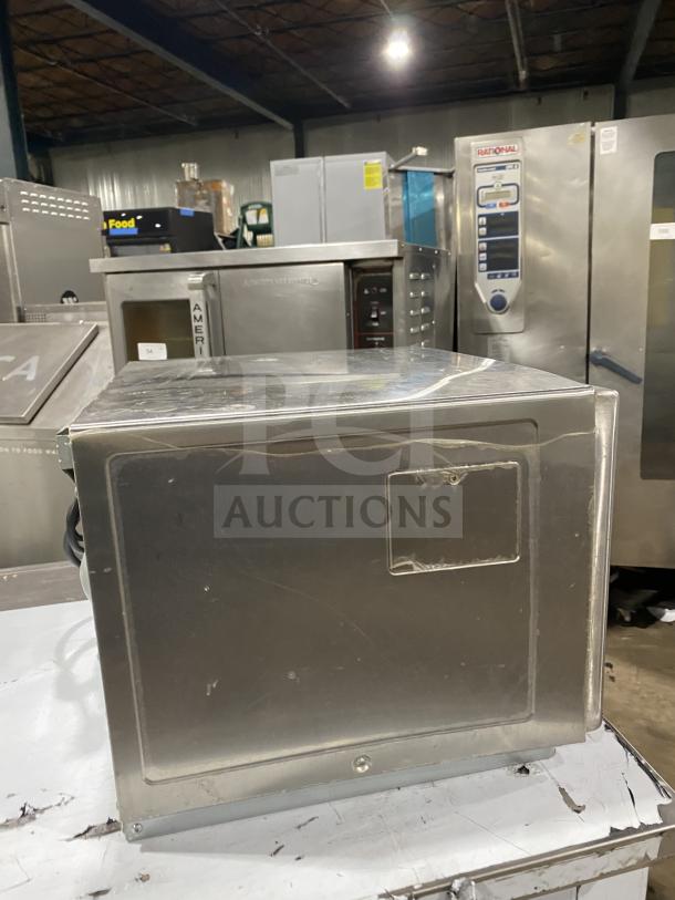 Menumaster RFS12TSW commercial microwave, stainless steel, with digital push button control, 120V, gently used.