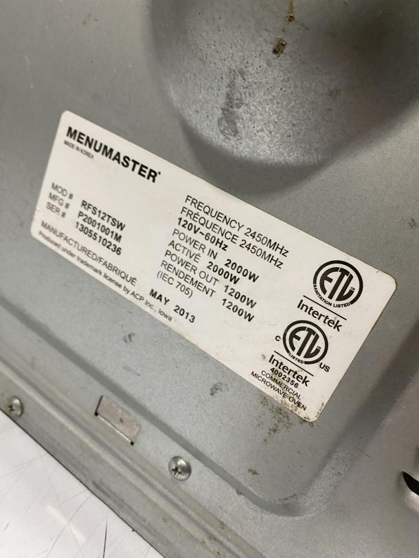 Menumaster RFS12TSW microwave oven label, showing model, serial number 1305510236, 120V, 2000W power details.
