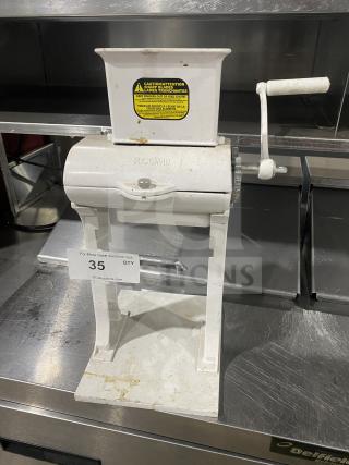 "Rcomb commercial manual heavy-duty meat cuber and tenderizer machine with hand crank, metal construction, used condition."
