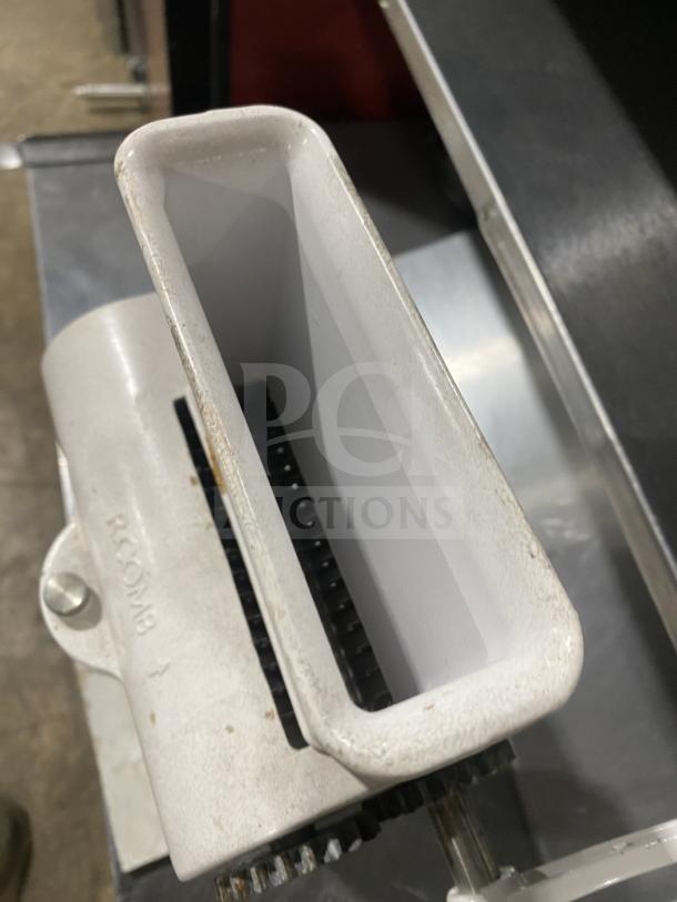 Rcomb Commercial Manual Heavy-Duty Meat Cuber & Tenderizer Machine, sturdy design, visible RCOMB label, slight wear.