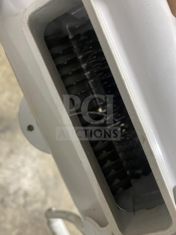 Alt text: Rcomb commercial heavy-duty meat cuber and tenderizer machine, showing interior blades, in good condition.