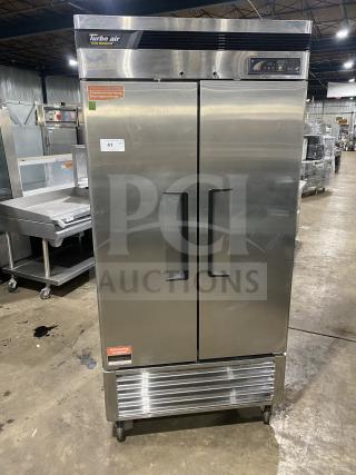 Turbo Air TSR-35SD stainless steel 2-door commercial refrigerator, model 115V, with self-cleaning condenser, excellent condition.