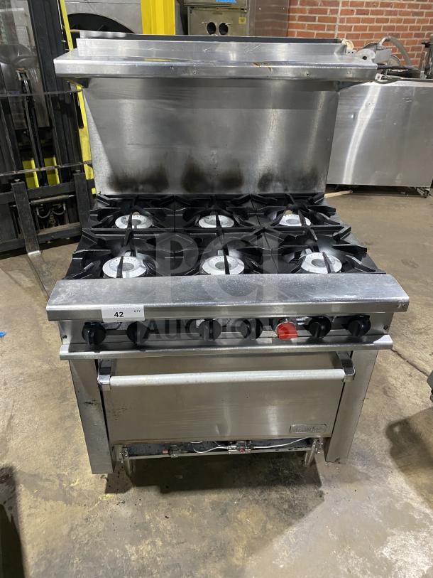 Therma-Tek 6 burner commercial stainless steel natural gas range, excellent condition, durable construction, model details visible.