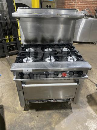 Therma-Tek 6 burner commercial stainless steel natural gas range, excellent condition, durable construction, model details visible.