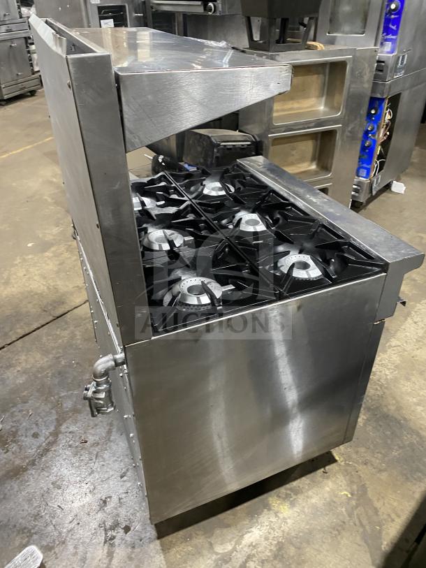 Therma-Tek 6-burner commercial stainless steel range with natural gas power; durable, industrial-grade condition.