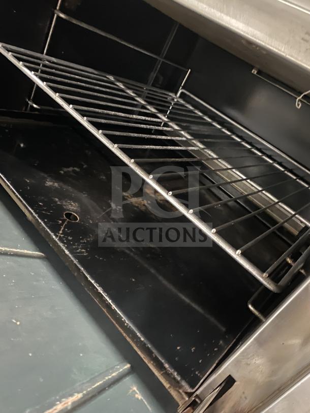 Therma-Tek stainless steel 6 burner range with oven, natural gas, commercial use, interior view, pre-owned condition.