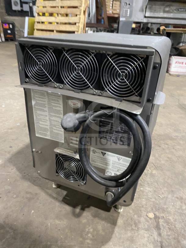 TurboChef NGO commercial rapid cook oven, electric, countertop model on legs. Features digital push controls, 208/240V, 1Phase.