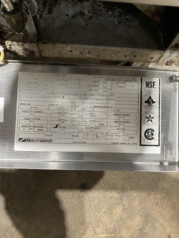 Southbend stainless steel 4-burner range/oven combo, model S241E, gas-powered, with backsplash and overhead. Serial: 19H172774.