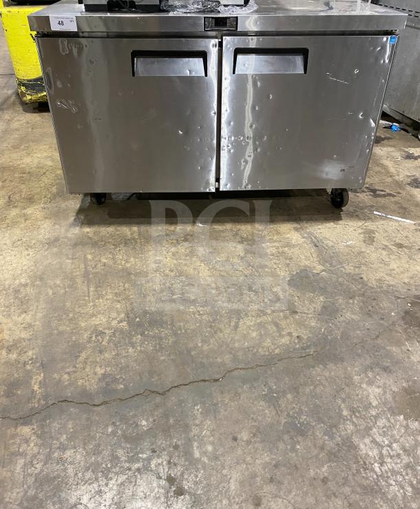 Migali C-U60R-HC stainless steel 2-door undercounter refrigerator with poly-coated rack, on casters. 115V, 1 phase.