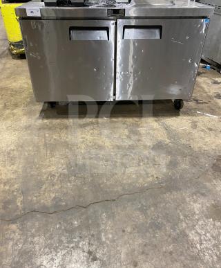 Migali C-U60R-HC stainless steel 2-door undercounter refrigerator with poly-coated rack, on casters. 115V, 1 phase.