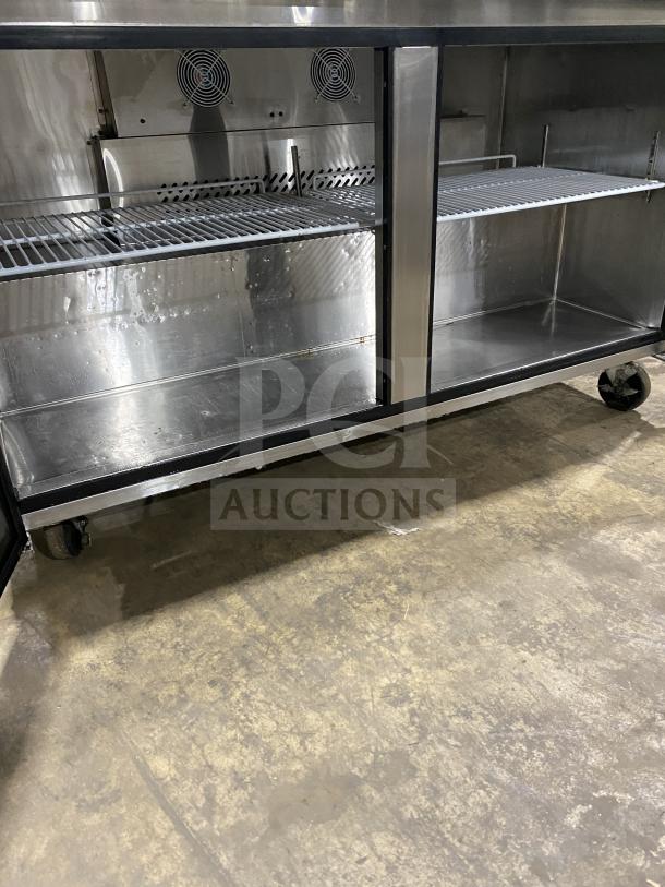 Migali 2-door undercounter refrigerator, Model C-U60R-HC, stainless steel, poly coated racks, on casters, 115V, 1 phase.