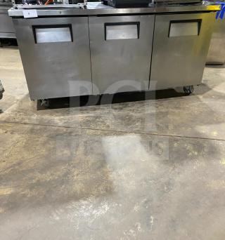 True TUC-72 stainless steel 3-door worktop refrigerator, Energy Star certified, upturned backsplash, on casters, model TUC-72.