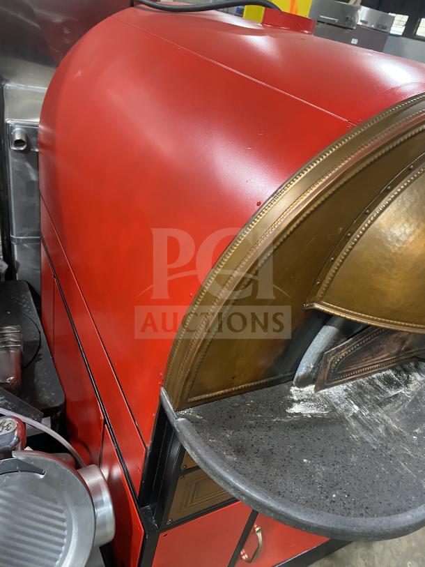 Red Izzo Forni Napoletano pizza oven, electric-powered, dome style, with wooden pizza paddle, excellent condition.