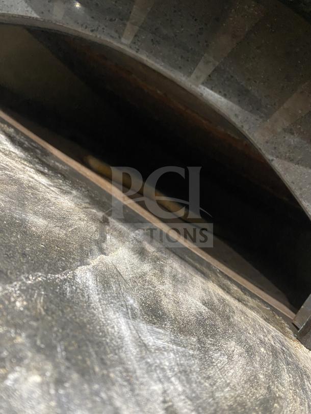 Izzo Forni red electric dome-style pizza oven with wooden paddle, commercial-grade, excellent condition, for Napoletano pizzas.